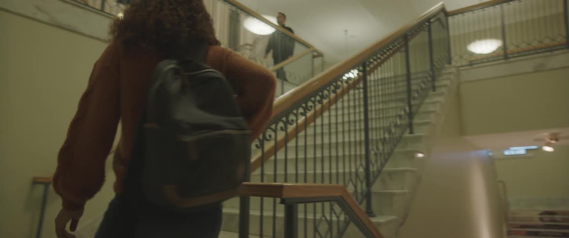 Students going up and down stairs at school