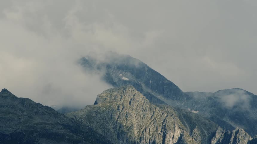 A rocky mountain under the cloud