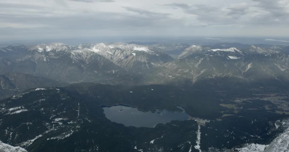 A scenery of a lake in the middle of forest
