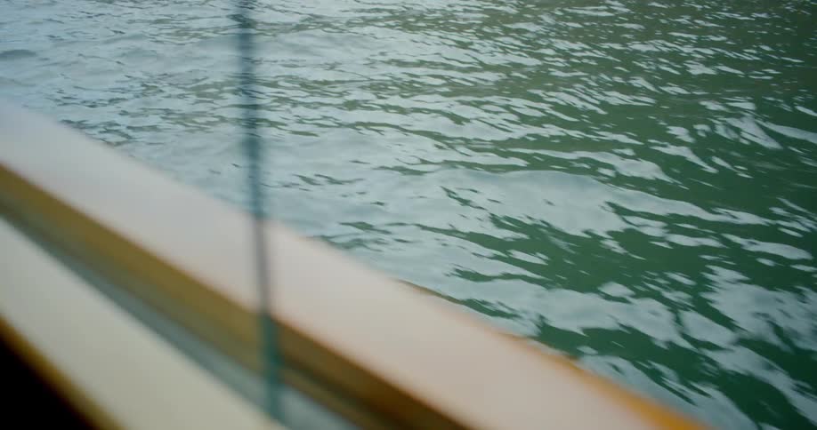 A view of body of water from boat window