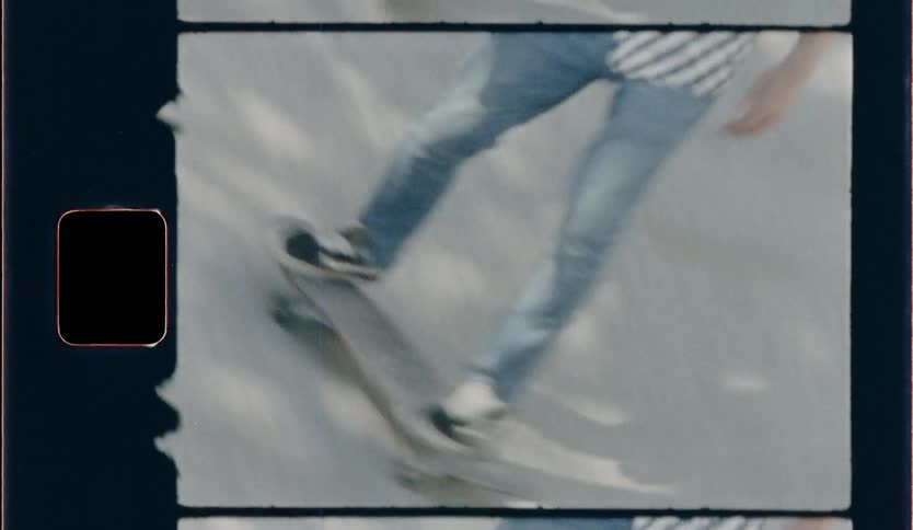 A video of a boy riding a skateboard