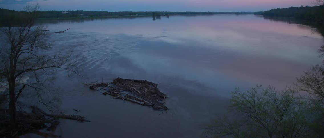 A view of a lake at sunset