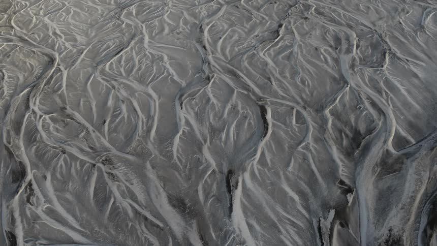 Patterns show in glacier during the day