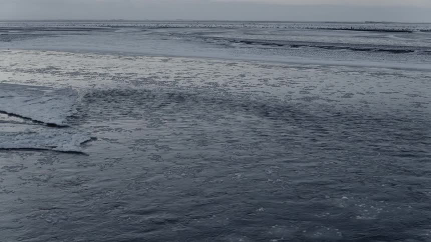 Patches of ice form in the ocean