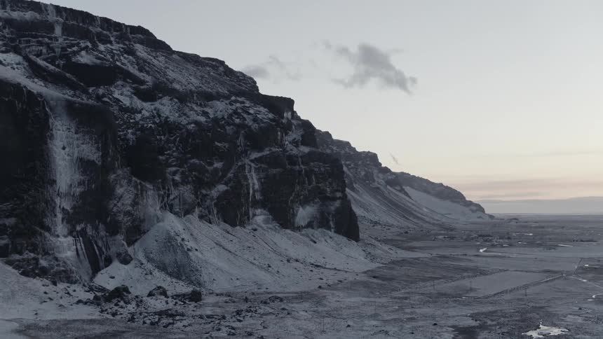 A scenery of a big rocky mountain