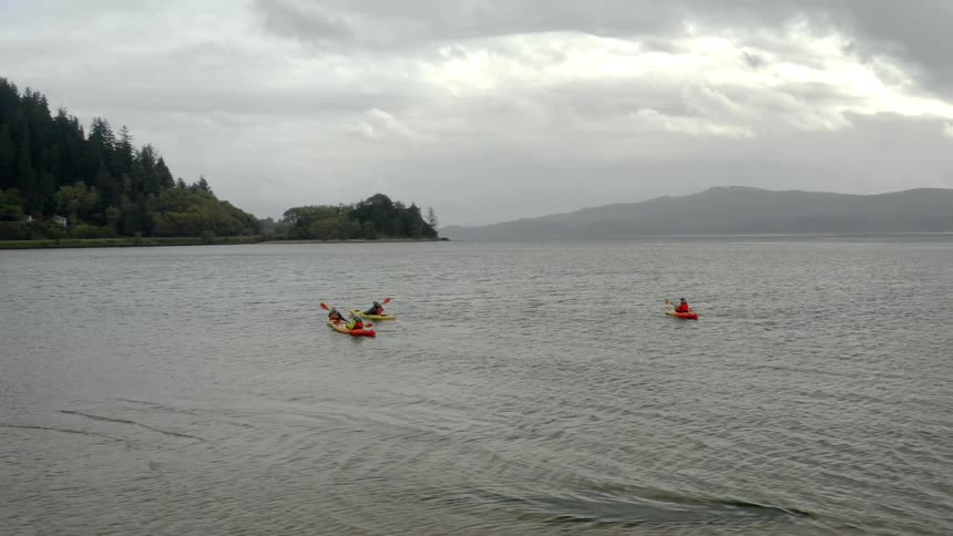 People kyaking on a lake