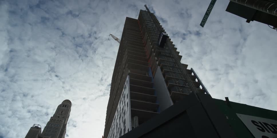 A skyscraper towers overhead