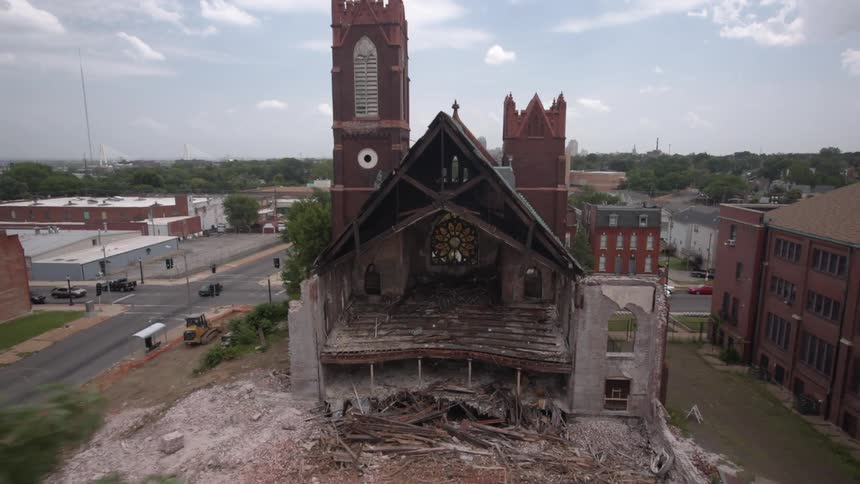View of a damaged building on a cloudy day