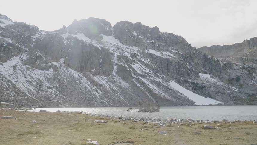 An icy mountain and lake