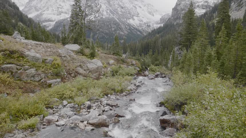 Water pours through the mountains