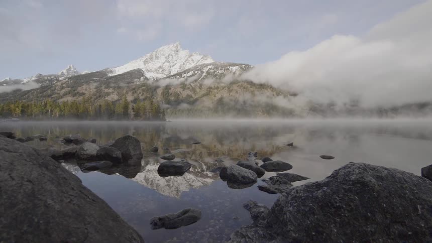 A mountain is in the horizon