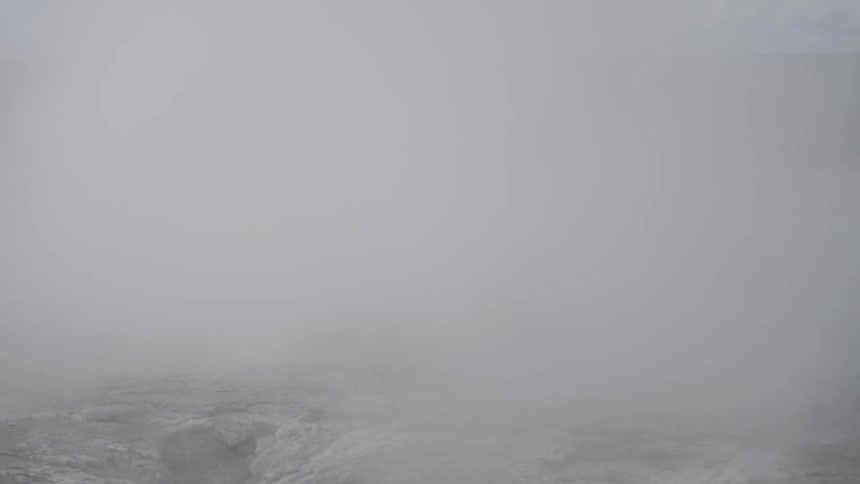 Fog over a snow covered field