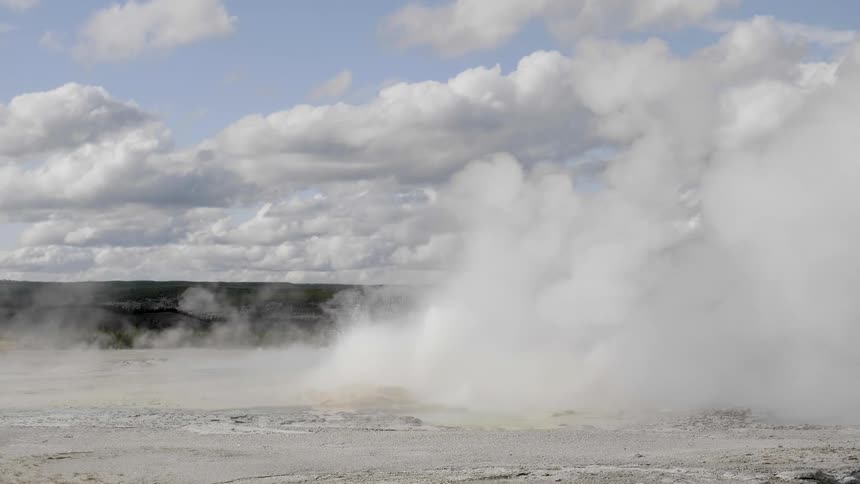 Steam geysers erupt from the ground