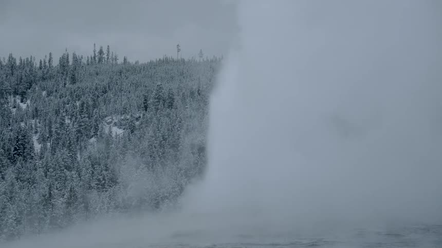 Snow is covering the trees and mountains