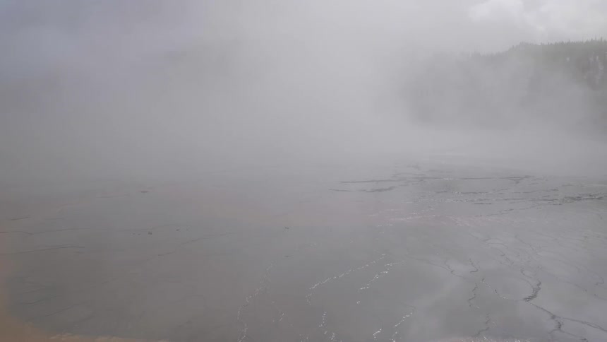 Fog rolls across the cracked ground