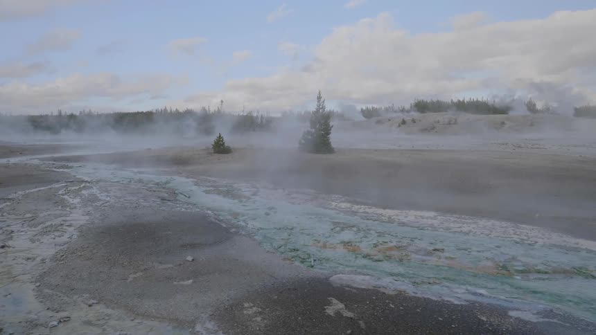 Landscape view of mist rising from the ground