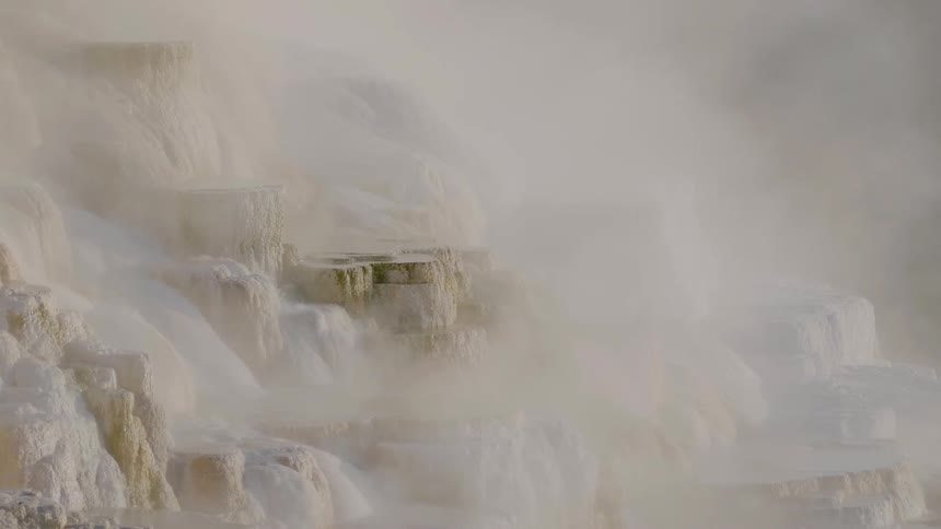 Waters flows down the side of a canyon