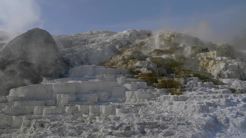 Steam comes out of a geological feature