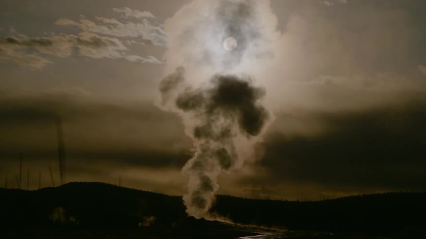 Steam rises from the ground