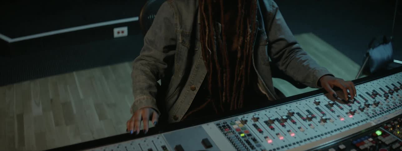 A young woman plays on a keyboard