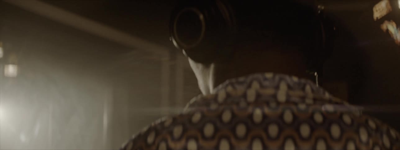 A man sings into the microphone