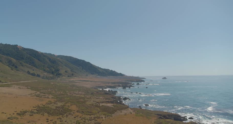 Hills and the coast and water below