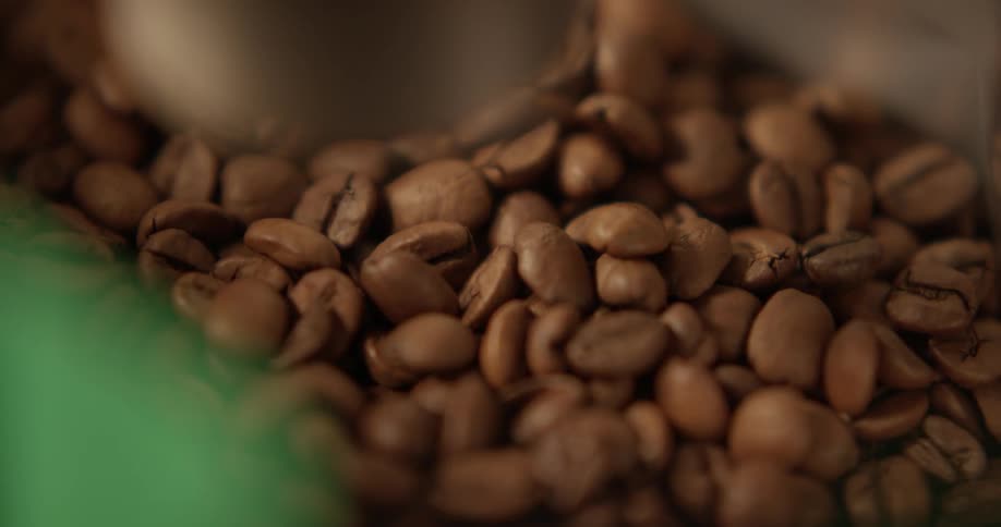 Coffee beans being poured in to a bag