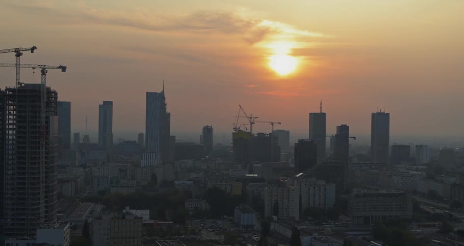 Skyline of the city with tall buildings and skyscrapers at sunset