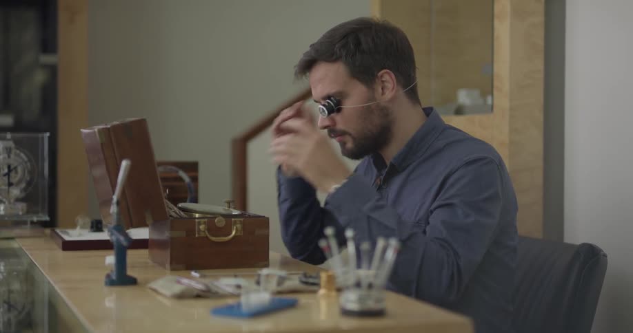 Man preparing to look close at something