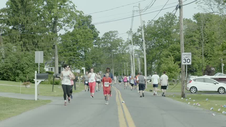 People are jogging outdoors in a race