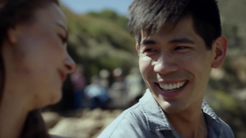 Two people laughing together