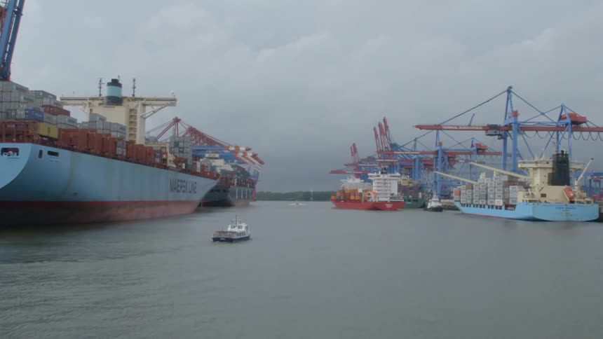 A port with cargo ships and boats
