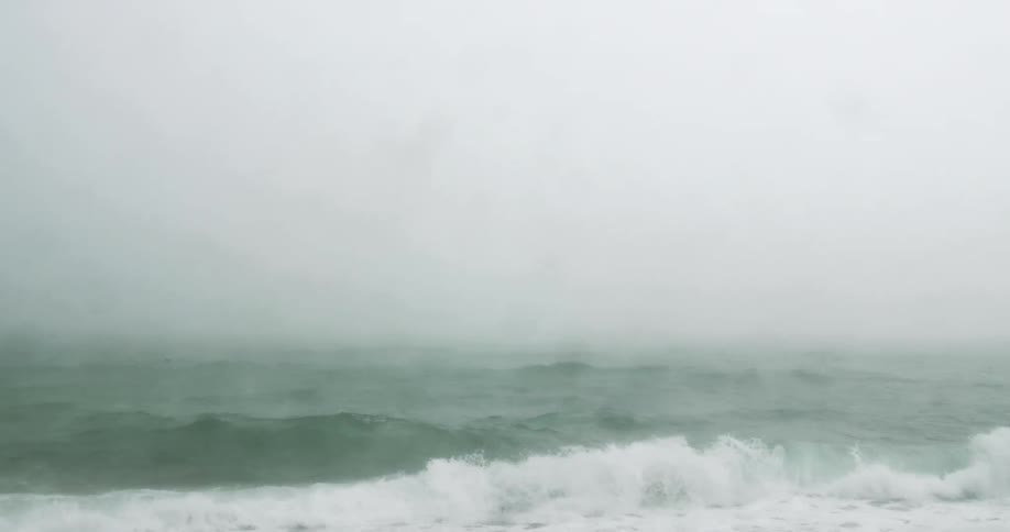 Heavy fog over the ocean waves