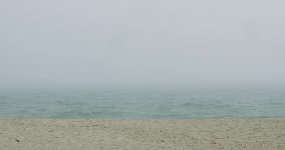 Water laps against a beach