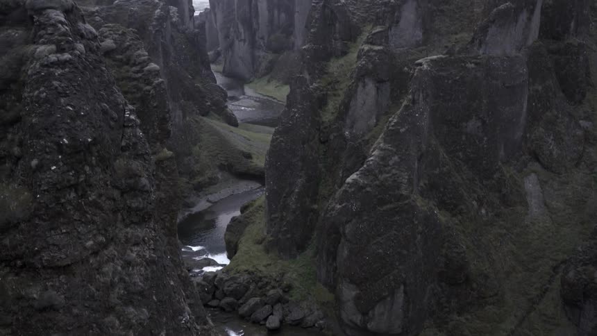 A stream runs through a mountain valley
