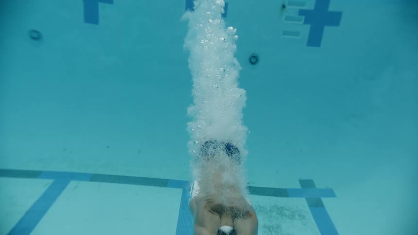 Swimmer diving underwater
