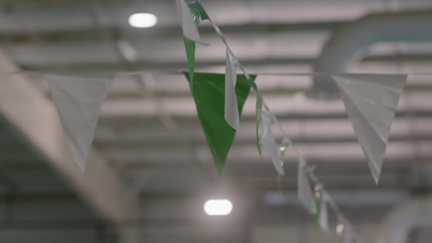 A footage of a triangle green flag