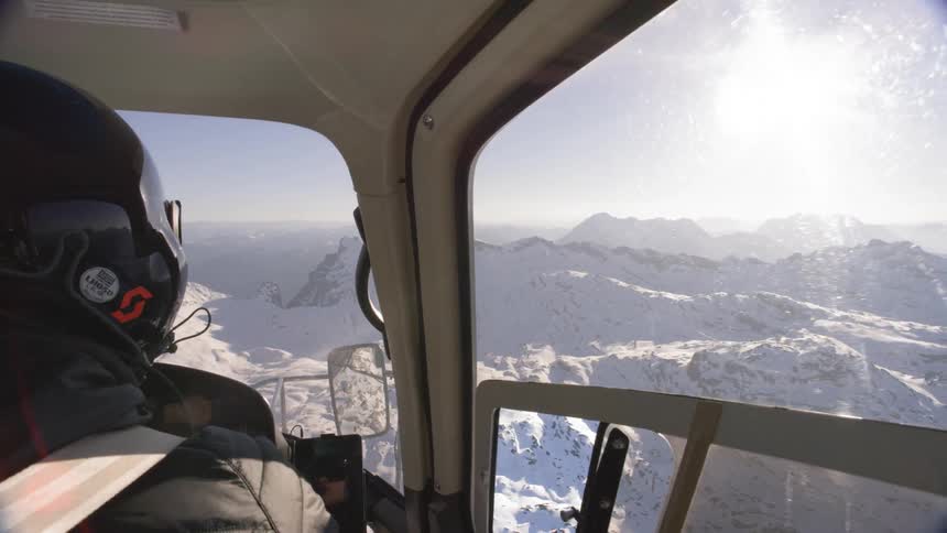 A person is looking at the mountains
