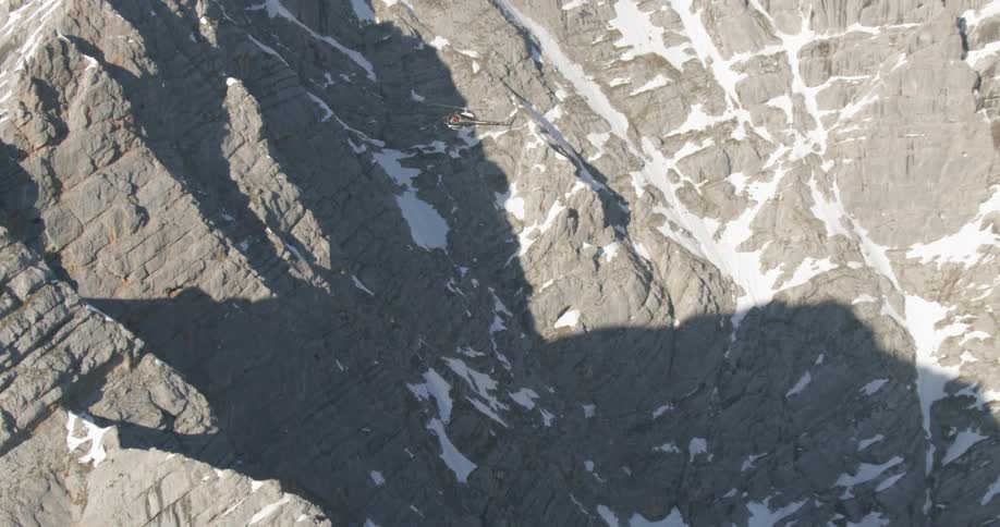 An aerial view of a snowy mountain
