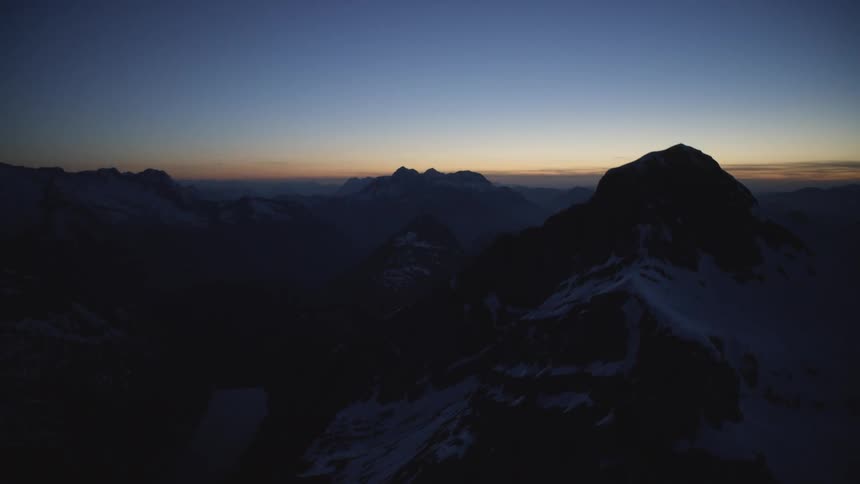 A scenery of a mountain range at dawn