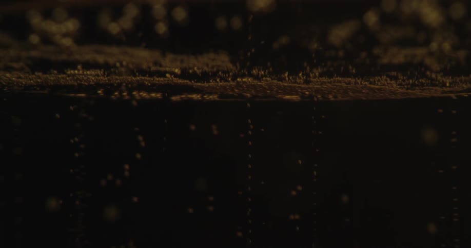 A close up view of gas bubble on a drink