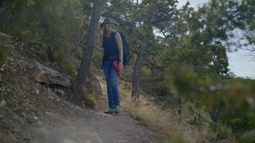 A female adventurer hike alone