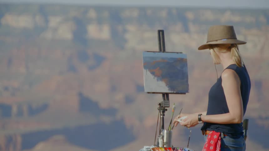 A female painter painting