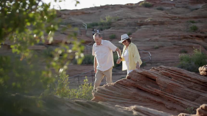 Couple hiking up a trail