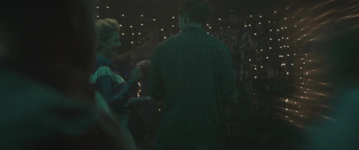 People are dancing in a room
