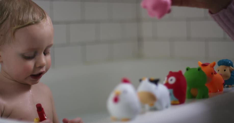 Child playing in a bathtub