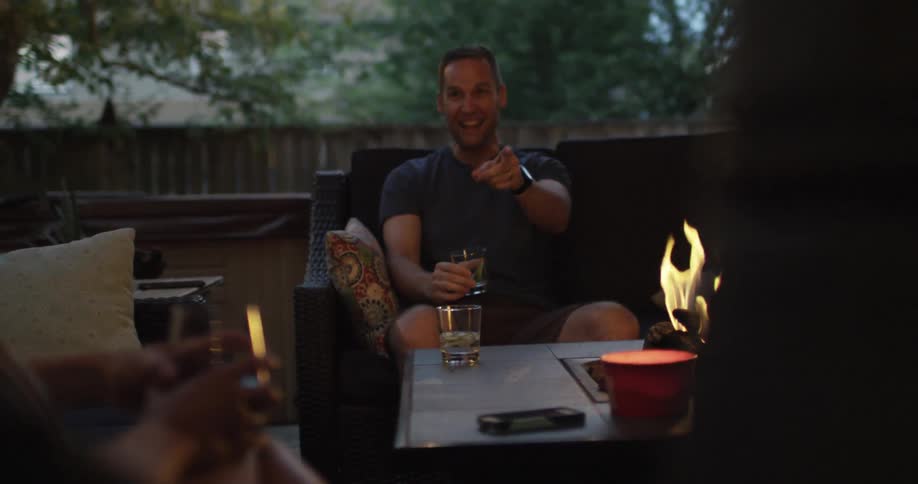 People sitting by a campfire