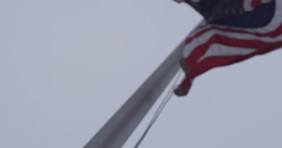 A flag flies at half staff