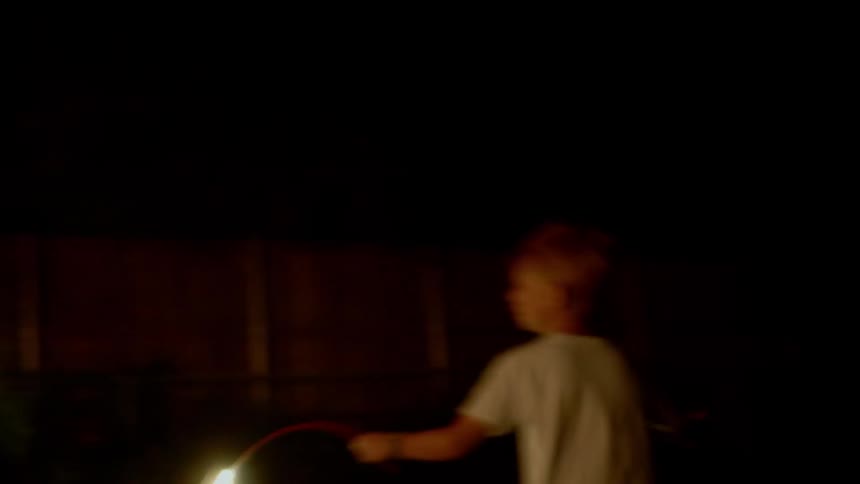 A child run with a fireworks