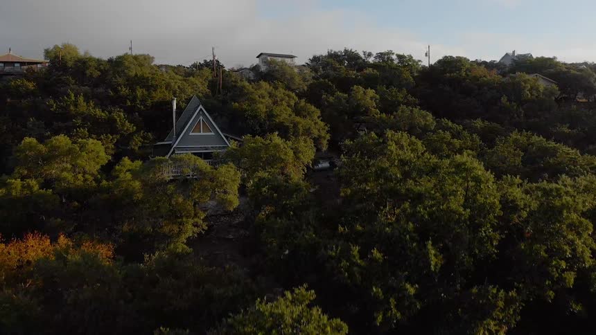 Aerial view of houses nestled in the trees